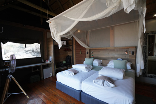 Twin beds in Bush Chalet at Dolomite Resort Etosha National Park